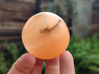 Polished Orange Twist Calcite Galets x 12 From Maevantanana, Madagascar