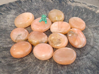 Polished Orange Twist Calcite Galets x 12 From Maevantanana, Madagascar