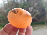 Polished Orange Twist Calcite Galets x 12 From Maevantanana, Madagascar