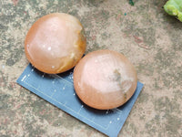 Polished Orange Twist Calcite Galets x 12 From Maevantanana, Madagascar