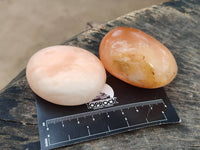 Polished Orange Twist Calcite Galets x 12 From Maevantanana, Madagascar