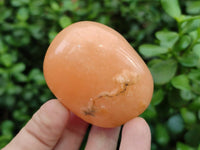 Polished Orange Twist Calcite Galets x 12 From Maevantanana, Madagascar