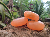 Polished Orange Twist Calcite Galets x 12 From Maevantanana, Madagascar