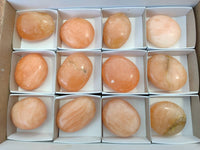 Polished Orange Twist Calcite Galets x 12 From Maevantanana, Madagascar