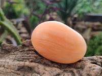 Polished Orange Twist Calcite Galets x 12 From Maevantanana, Madagascar