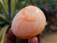 Polished Orange Twist Calcite Galets x 12 From Maevantanana, Madagascar