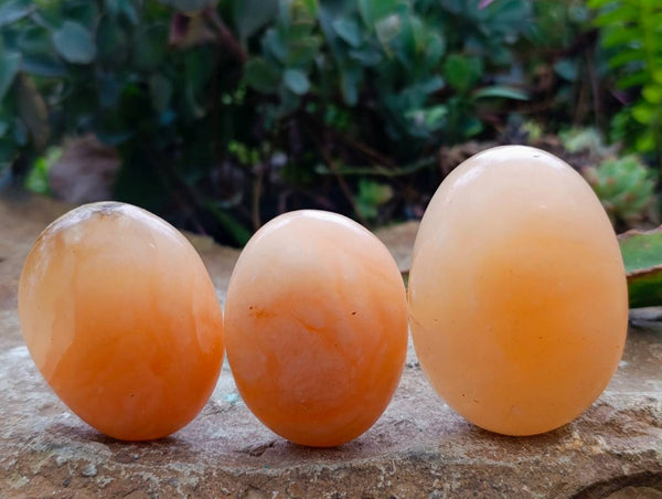 Polished Orange Twist Calcite Galets x 12 From Maevantanana, Madagascar