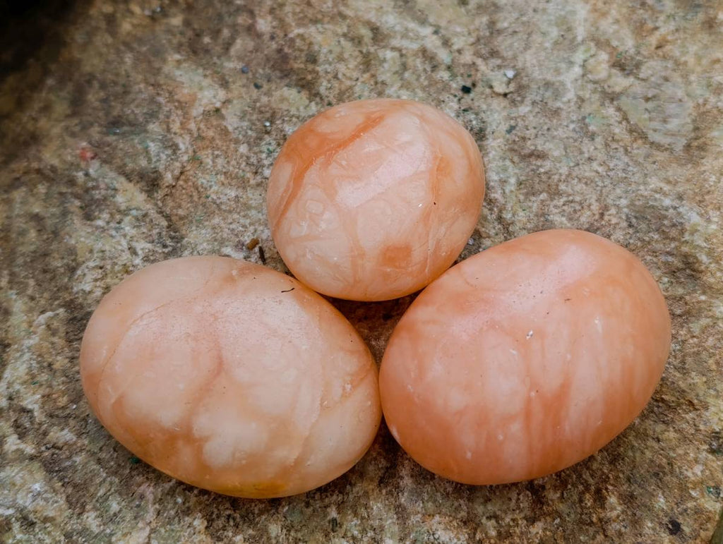 Polished Orange Twist Calcite Galets x 12 From Maevantanana, Madagascar - Toprock Gemstones and Minerals 