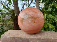 Polished Orange Twist Calcite Sphere x 1 From Maevantanana, Madagascar