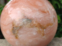 Polished Orange Twist Calcite Sphere x 1 From Maevantanana, Madagascar