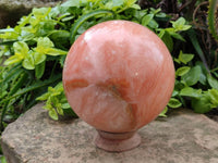 Polished Orange Twist Calcite Sphere x 1 From Maevantanana, Madagascar