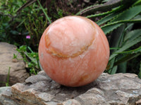Polished Orange Twist Calcite Sphere x 1 From Maevantanana, Madagascar