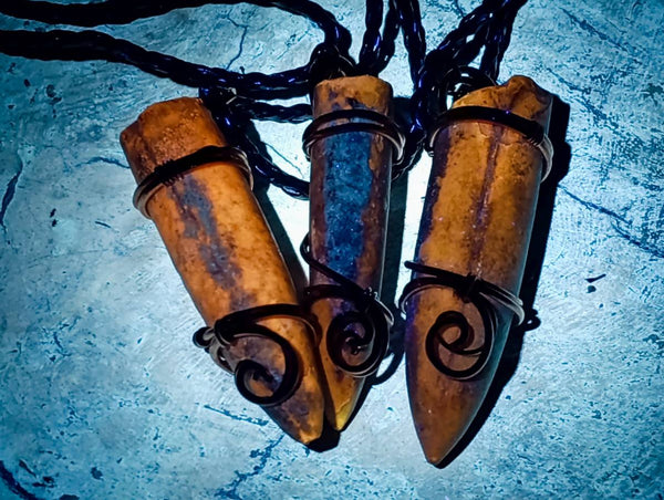 Natural Belemnite Fossil Bullet Copper Art Pendant With Plaited Cord - sold per piece - From Madagascar