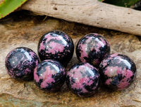 Polished Rhodonite Spheres x 6 From Ambindavato, Madagascar