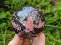 Polished Rhodonite Spheres x 2 From Ambindavato, Madagascar - Toprock Gemstones and Minerals 