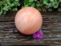 Polished Orange Twist Calcite Sphere x 1 From Maevantanana, Madagascar
