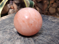 Polished Orange Twist Calcite Sphere x 1 From Maevantanana, Madagascar