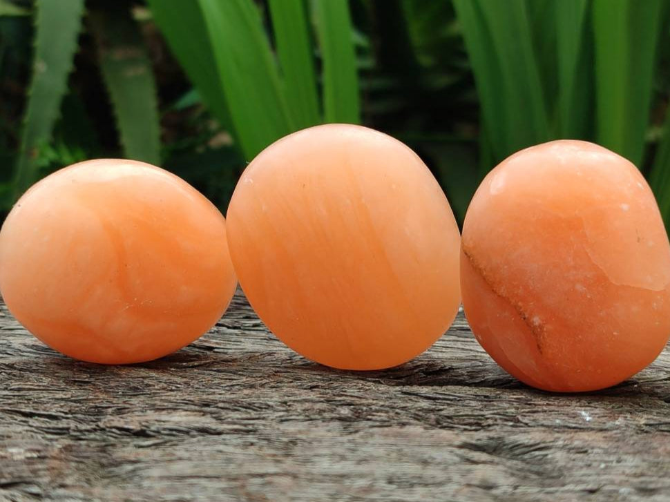 Polished Orange Twist Calcite Galets x 20 From Maevantanana, Madagascar