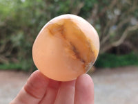 Polished Orange Twist Calcite Galets x 20 From Maevantanana, Madagascar