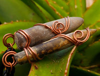 Natural Belemnite Fossil Bullet Copper Art Pendant With Plaited Cord - sold per piece - From Madagascar