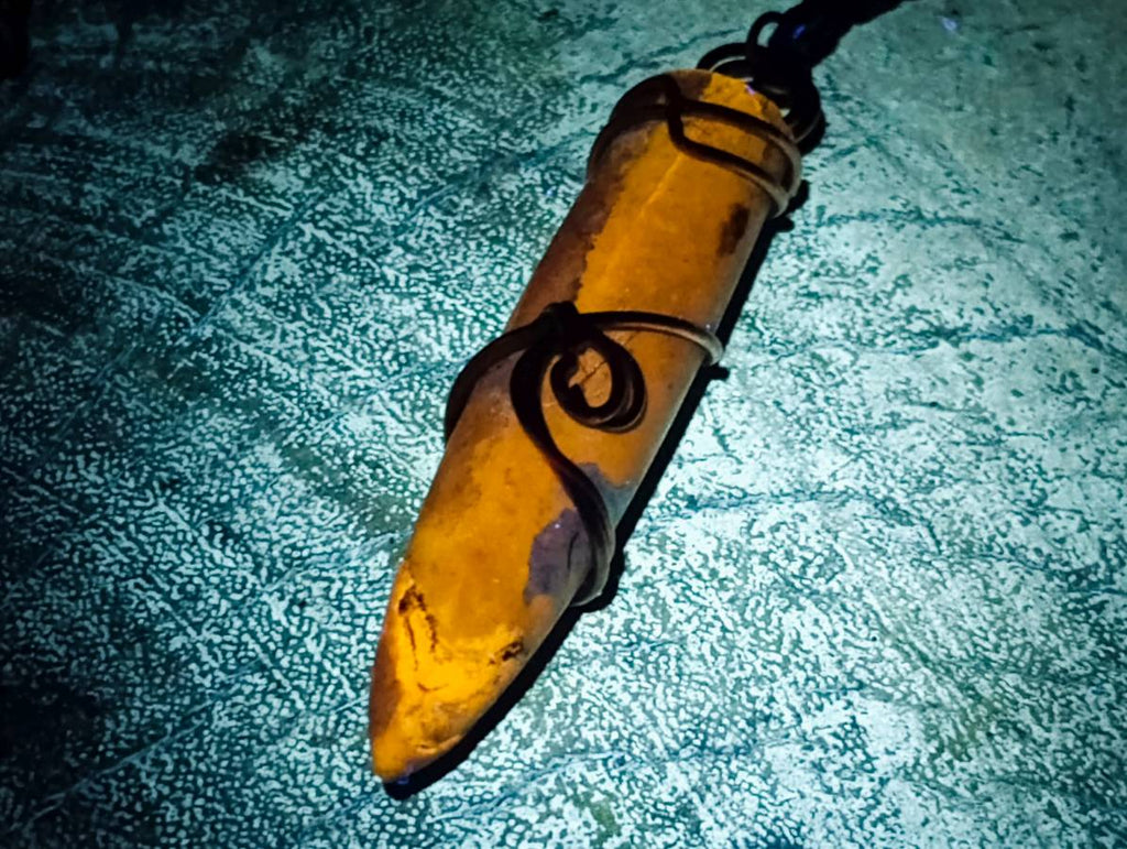 Natural Belemnite Fossil Bullet Copper Art Pendant With Plaited Cord - sold per piece - From Madagascar