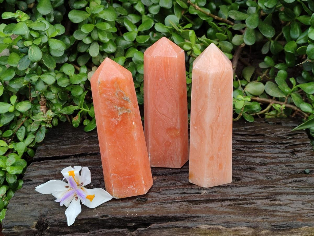 Polished Orange Twist Calcite Points x 3 From Maevantanana, Madagascar