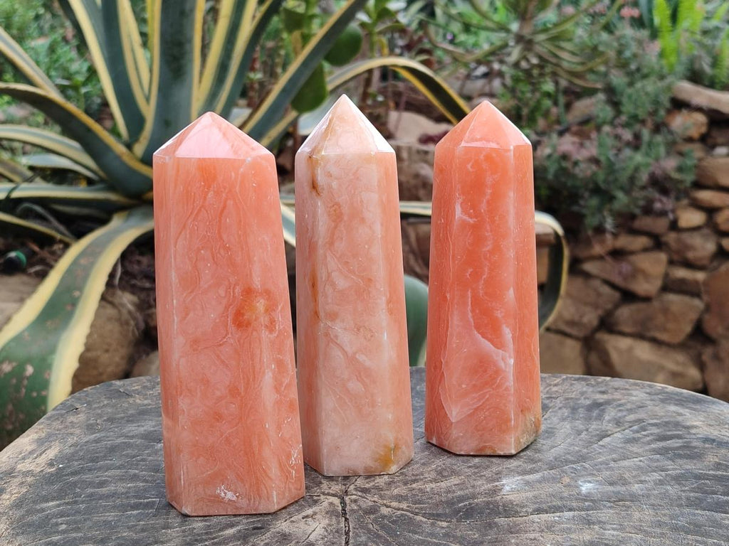 Polished Orange Twist Calcite Points x 3 From Maevantanana, Madagascar