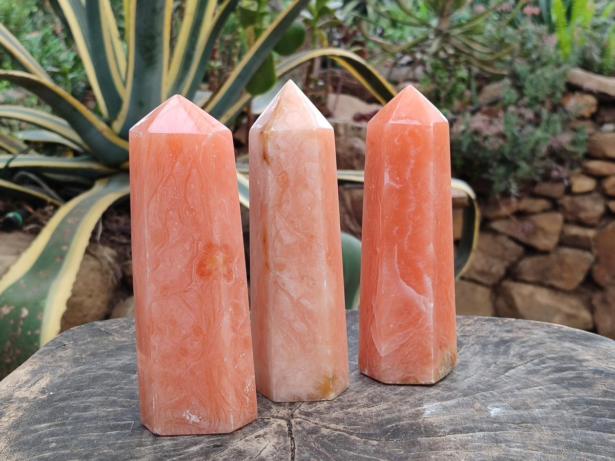 Polished Orange Twist Calcite Points x 3 From Maevantanana, Madagascar