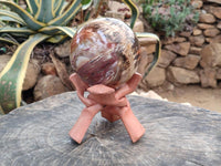 Polished XL Red Podocarpus Petrified Wood Sphere x 1 From Mahajanga, Madagascar