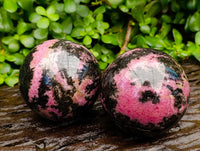 Polished Rhodonite Spheres x 2 From Ambindavato, Madagascar