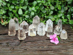 Polished Mix of Smokey and Clear Quartz Crystals x 12 From Madagascar