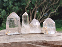 Polished Mixed Clear Quartz Crystals with Inclusions x 12 From Madagascar