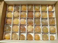 Polished Rounded Golden Healer Quartz Crystal Free Forms x 35 From Ambatofinandrahana, Madagascar