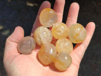 Polished Rounded Golden Healer Quartz Crystal Free Forms x 35 From Ambatofinandrahana, Madagascar