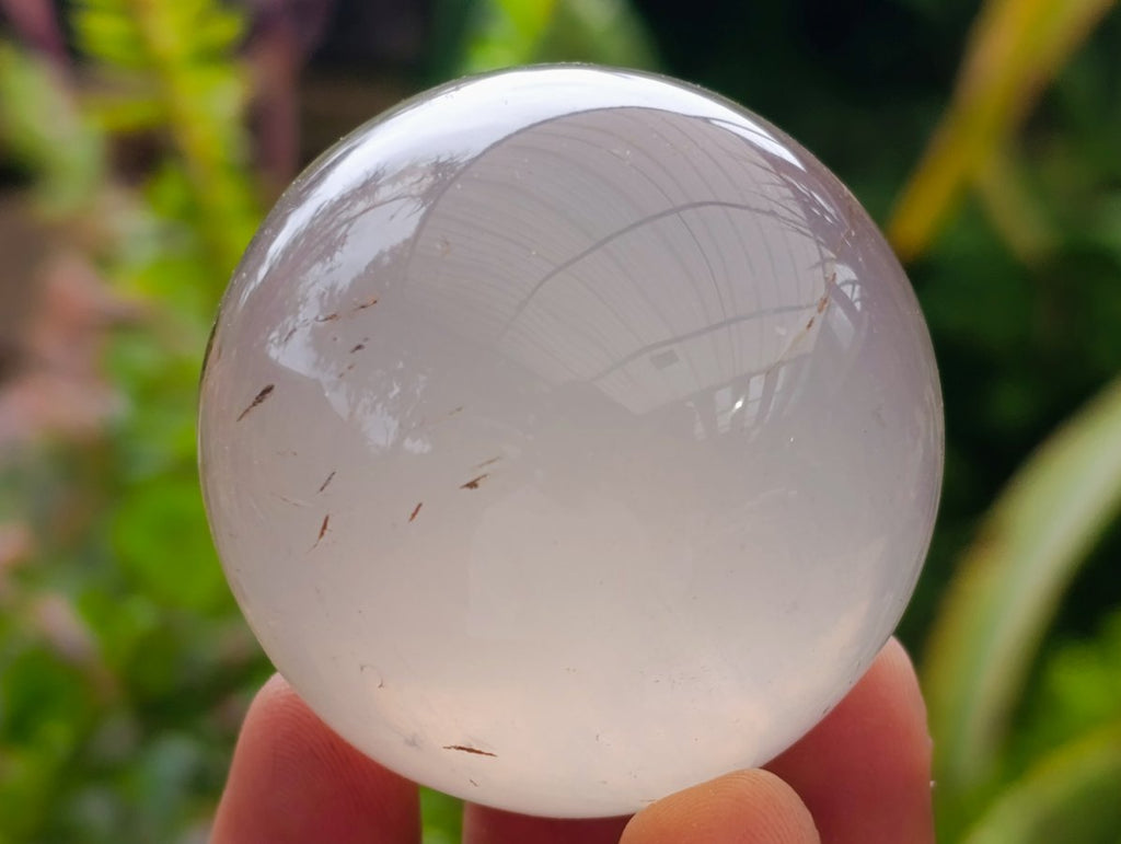 Polished Clear Smokey Quartz and Girasol Spheres x 12 From Madagascar