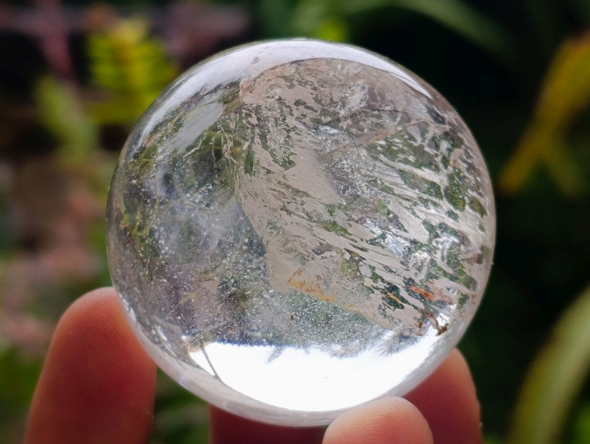 Polished Clear Smokey Quartz and Girasol Spheres x 12 From Madagascar