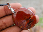 Hand Made Red Podocarpus Petrified Wood Mixed Shaped Pendants x 12 From Madagascar