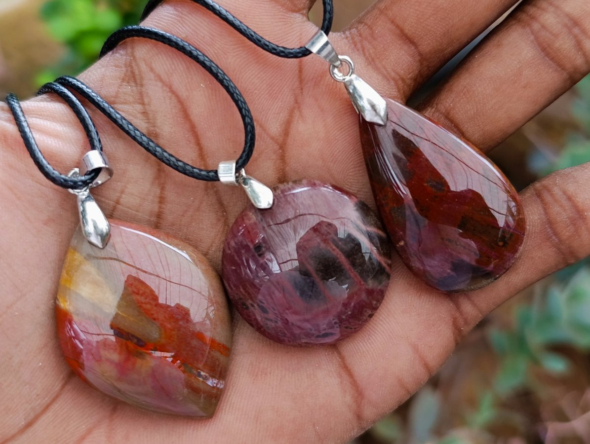 Hand Made Red Podocarpus Petrified Wood Mixed Shaped Pendants x 12 From Madagascar