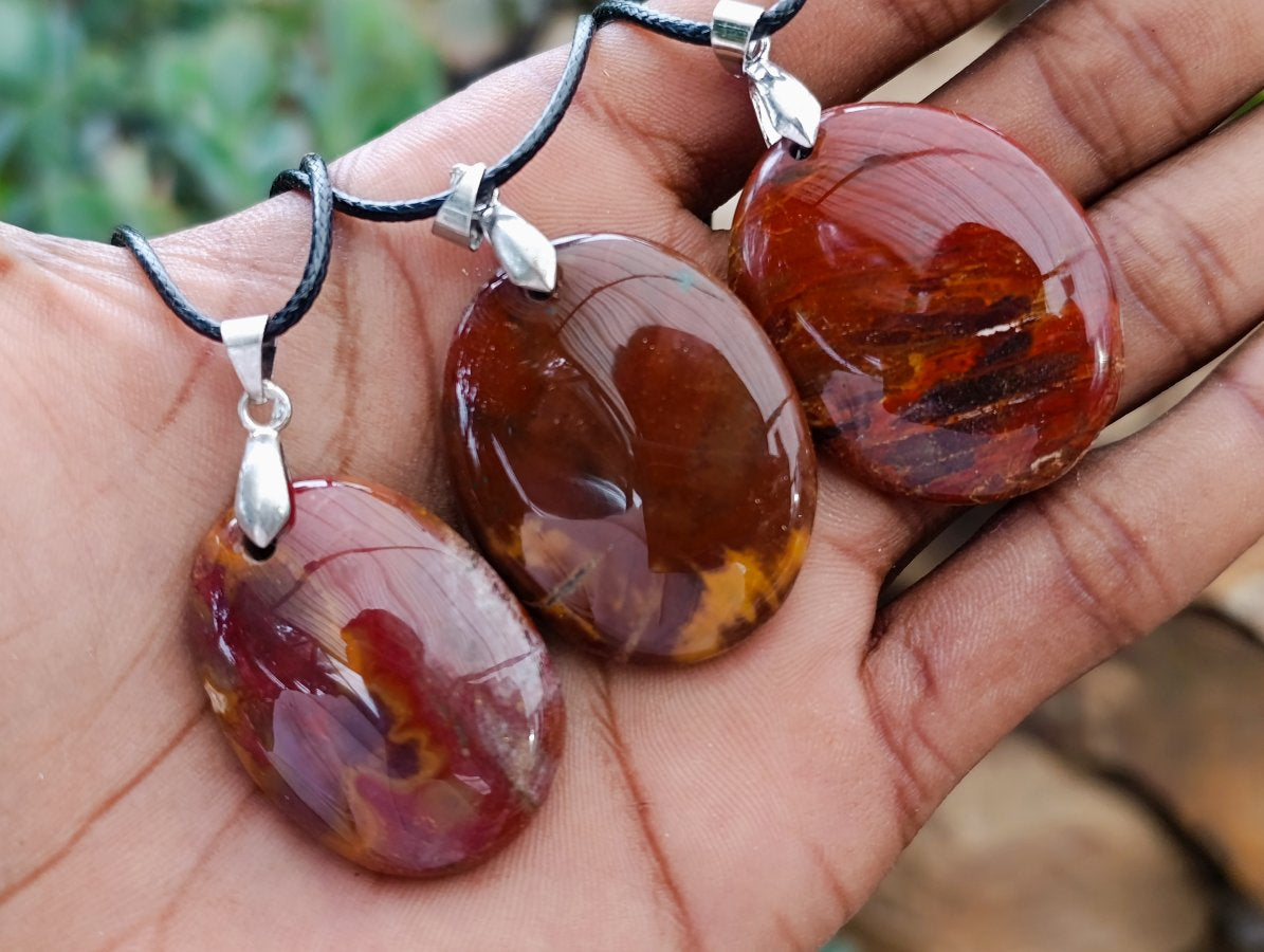 Hand Made Red Podocarpus Petrified Wood Mixed Shaped Pendants x 12 From Madagascar