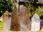 Mixed Polished Smokey And Clear Quartz Crystals x 4 From Madagascar