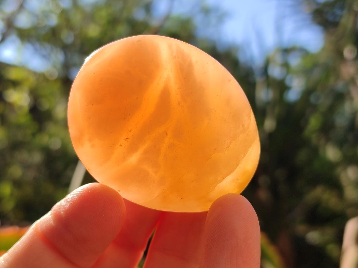 Polished Orange Twist Calcite Galets x 25 From Maevantanana, Madagascar - Toprock Gemstones and Minerals 