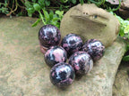 Polished Rhodonite Gemstone Spheres x 6 From Ambindavato, Madagascar - Toprock Gemstones and Minerals 