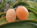 Polished Orange Twist Calcite Galets x 25 From Maevantanana, Madagascar - Toprock Gemstones and Minerals 
