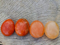 Polished Orange Twist Calcite Galets x 28 From Maevantanana, Madagascar - Toprock Gemstones and Minerals 