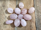 Polished Gemmy Rose Quartz Palm Stones x 35 From Madagascar - Toprock Gemstones and Minerals 