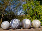 Polished Banded Agate Spheres x 4 From Madagascar - Toprock Gemstones and Minerals 