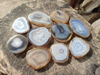Polished Banded Agate Slices with Natural Edging x 12 From Madagascar - Toprock Gemstones and Minerals 