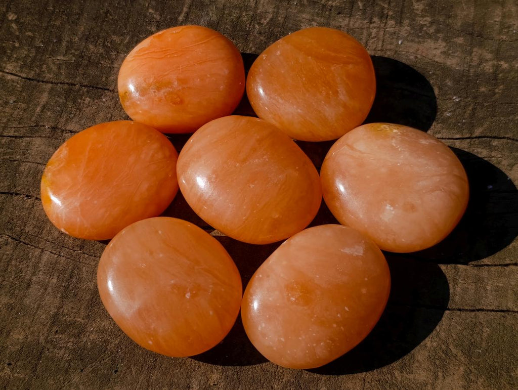 Polished Orange Twist Calcite Galets x 24 From Maevantanana, Madagascar
