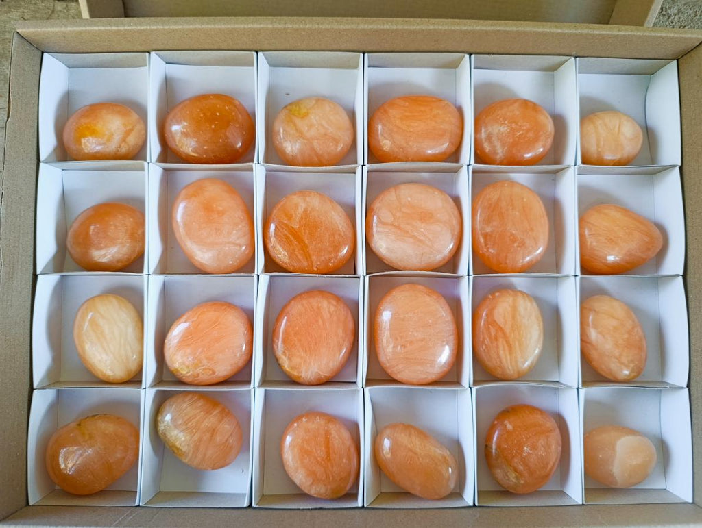 Polished Orange Twist Calcite Galets x 24 From Maevantanana, Madagascar