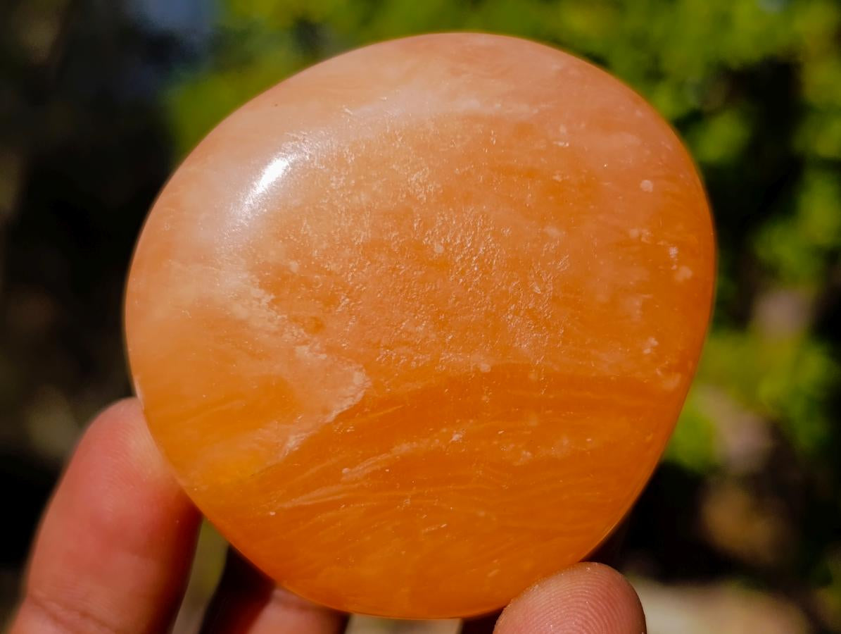 Polished Orange Twist Calcite Galets x 24 From Maevantanana, Madagascar